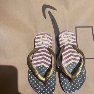 Havaianas Kids Flip Flops in Gold and Blue